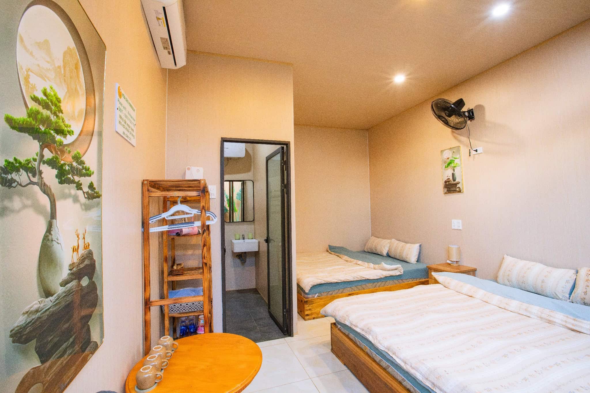 homestay Măng Đen trang trí phòng đôi homestay hoa cúc